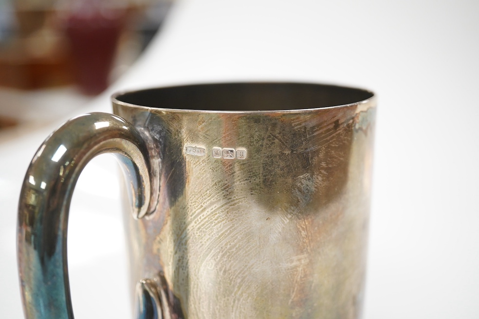 A group of assorted small silverwares including a christening mug, three salts and a pair of mustard pots, 11.5 oz of weighable silver. Condition - fair